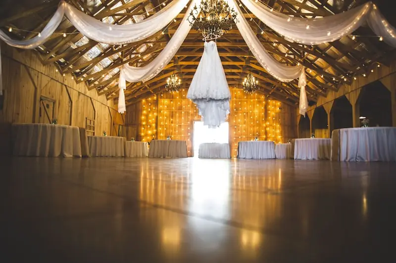 Long tables dressed in white linen.